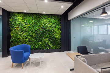 Interior shots of offices with flora and fauna or vertical gardens