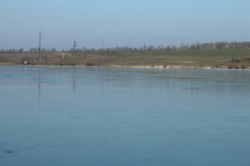 A body of water with a sign on it