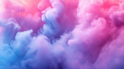Dreamy pink and blue smoke clouds forming soft abstract background