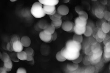 Monochrome abstract of blurred out of focus lights creating an evocative texture