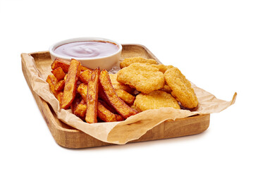 Enjoy Crispy Chicken Nuggets served alongside Sweet Potato Fries and a flavorful Dipping Sauce