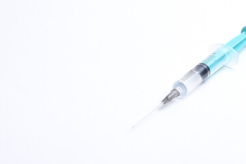 Fototapeta premium Disposable plastic syringe prepared for injection and vaccination in the hospital. The concept of medicine and health 