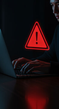 Cyber Threat Alert: Hacker at Work. Security Breach, Data Risk, & Online Danger. Stay Safe From Phishing, Malware, & Scams!