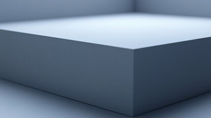 Soft light illuminates a sleek grey cube subtly resting on a pale surface. AI Generated