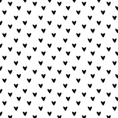 Hand drawn heart seamless pattern. Doodle hipster simple background about love for Valentines day. Trendy simple texture with tiny little hearts.