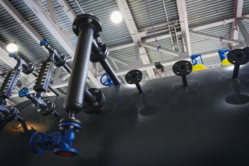 Industrial concept. Boiler equipment - valves, tubes, pressure gauges, thermometers, heaters,...
