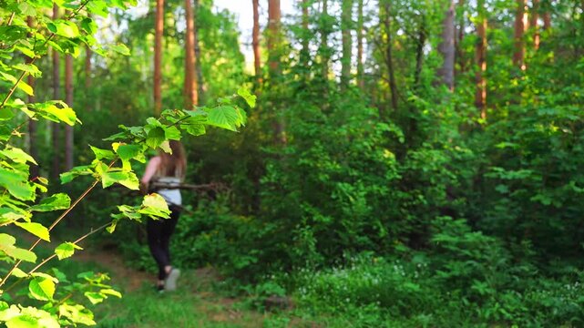 Girl alone on a hike in the forest