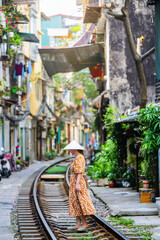 Woman standing on Hanoi's Train Street