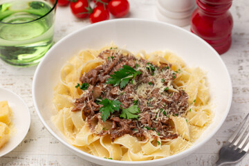 close up of tegliatelle pasta with slow cooked beef ragout