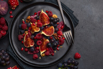 Raw vegan fruits and berries salad