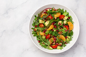 tangerine, avocado and  tomatoes salad