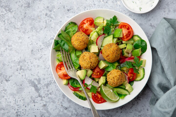 Vegan falafel and vegetables salad