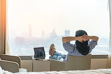 Work-Life balance and life quality lifestyle of lazy businesswoman, business woman relaxing sitting...