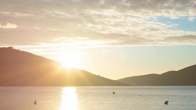 Timelapse of stunning textured sky in the mountains on the seashore