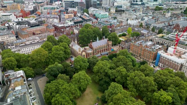 Aerial view drone shot over Lincoln Inn Fields, New Square London UK panning left