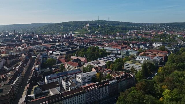 Aerial drone view of Stiftung Juliusspital W&uuml;rzburg, Germany. This architectural landmark features Baroque buildings, a grand courtyard, and lush vineyards. 
