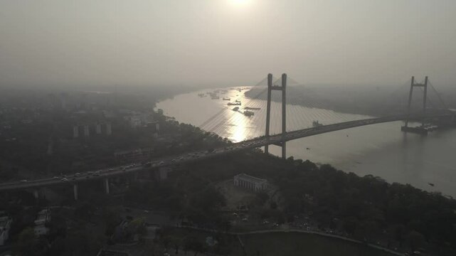 Kolkata Victoria Memorial Vidyasagar Setu Eden Garden Maidan 42 Biswa Bangla New Town Sector 5 Salt Lake view drone footage aerial view. Indian roads and landmarks of subcontinent empty roads.