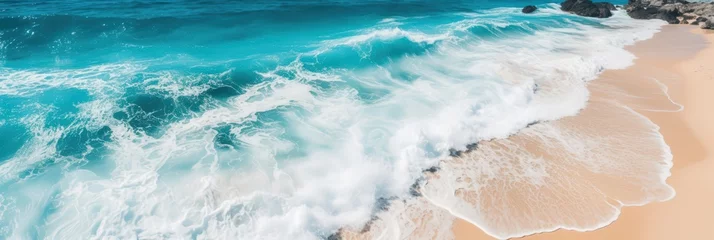 Fotobehang Serene Ocean Waves Gently Breaking on the Shore with Clear Blue Waters and Soft Sandy Beach Under a Bright Sunny Sky © Planetz