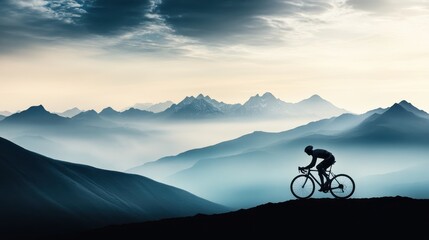 Obraz premium A lone cyclist rides through misty mountains under a dramatic sky, capturing the essence of adventure and tranquility in nature.
