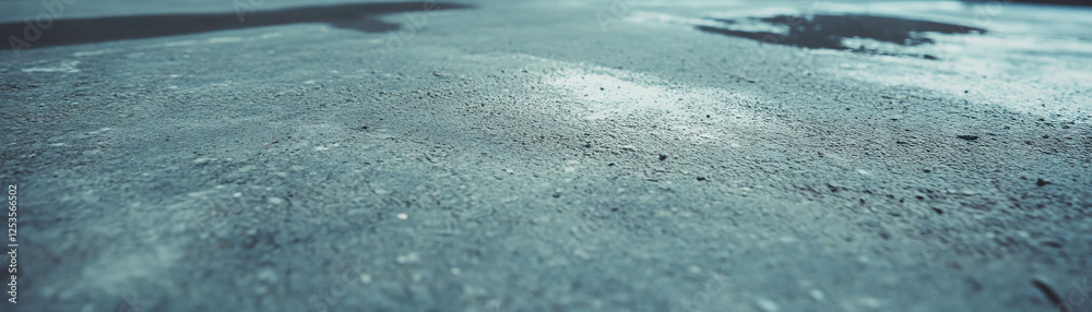 Poster broom finished concrete with textured surface and non-slip properties in bright background