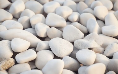 Fototapeta premium Light gray and white pebbles in a delicate organic arrangement with smooth surface and soft texture