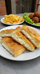 Cheese Burek Delight: Crispy Pastry Slices, Golden Fries & Savory Kroketten ? A Balkan Feast!