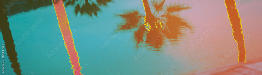 Poster reflection of palm trees in shimmering wet sand with vibrant neon outlines at sunset