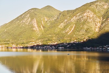 Serene Kotor Bay at golden hour sunset