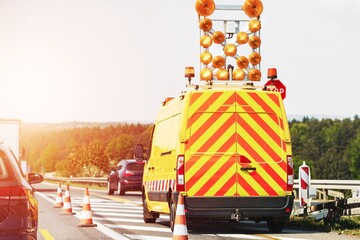 Highway maintenance van with chevron reflective pattern
