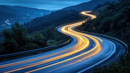 Winding mountain road at night, light trails, village background; travel, adventure