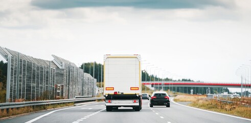 White cargo truck on highway