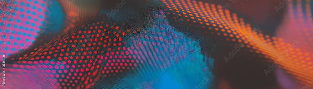 Poster close-up view of woven fabric showcasing halftone texture with vibrant colors and patterns