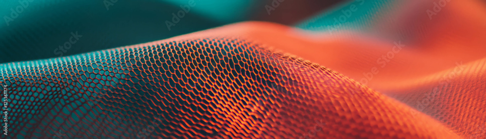 Poster close-up view of textured woven fabric with halftone dots in vibrant colors