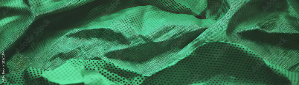 Poster textured surface with halftone effect resembling crumpled paper under soft lighting