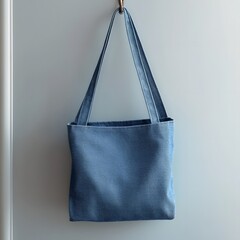 Denim Fabric Sling Bag Mockup Hanging on Hook in Plain and Unbranded Design