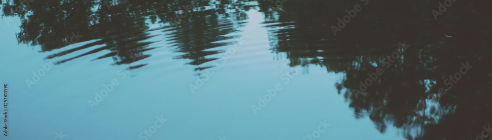 Poster reflections of trees in still water showcasing halftone texture and distorted shapes