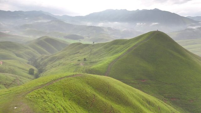 landscape with green grass and mountains, Phou Hua Lon, Xaysomboun, Laos