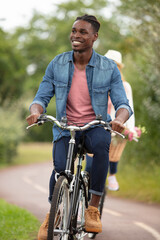 Obraz premium happy man is cycling outdoors
