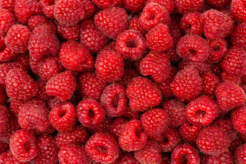 Tasty fresh raspberry as a background.