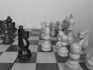 Chess pieces on the chess board. Old strategy game