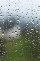 Raindrops on the glass in the window. Wet window after rain. Rain outside the window.