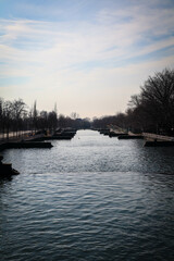 a calm river water running down the canal