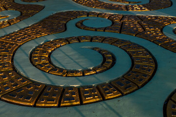 Background of the tourist attraction Wat Sirindhorn Wararam or the famous glowing temple in Thailand. Ubon Ratchathani is adjacent to Laos. Tourists always like to come to see the beauty at night.