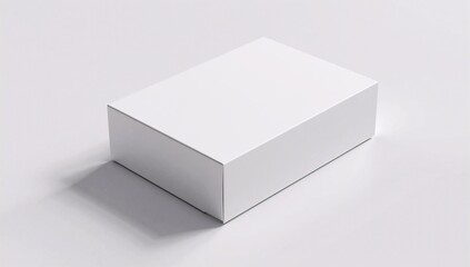 Naklejka premium A clean mock up, sleek white rectangular box on a white background, casting a soft shadow. Perfect for packaging, storage, or design projects.