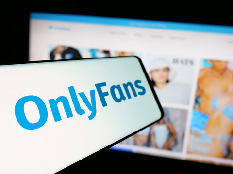 Stuttgart, Germany - 01-31-2025: Cellphone with logo of British subscription platform company OnlyFans on screen in front of business website. Focus on center-left of phone display.
