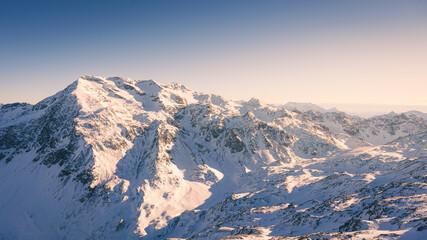 Majestic Alpine Peak Under Winter Sun (Bormio, Italy)