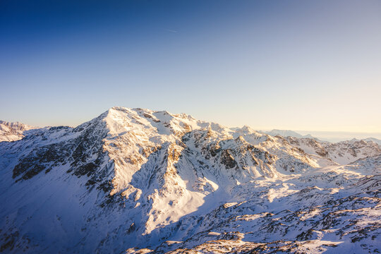 Majestic Alpine Peak Under Winter Sun (Bormio, Italy)
