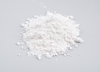 Tricalcium phosphate, sometimes abbreviated TCP, more commonly known as Calcium phosphate.