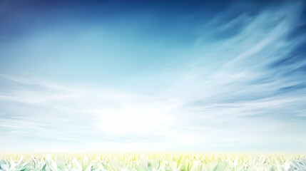 Obraz premium Tranquil meadow landscape with blue sky and clouds, used for background, wallpaper, or to convey serenity and peace