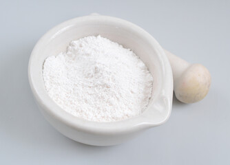 Tricalcium phosphate, sometimes abbreviated TCP, more commonly known as Calcium phosphate.